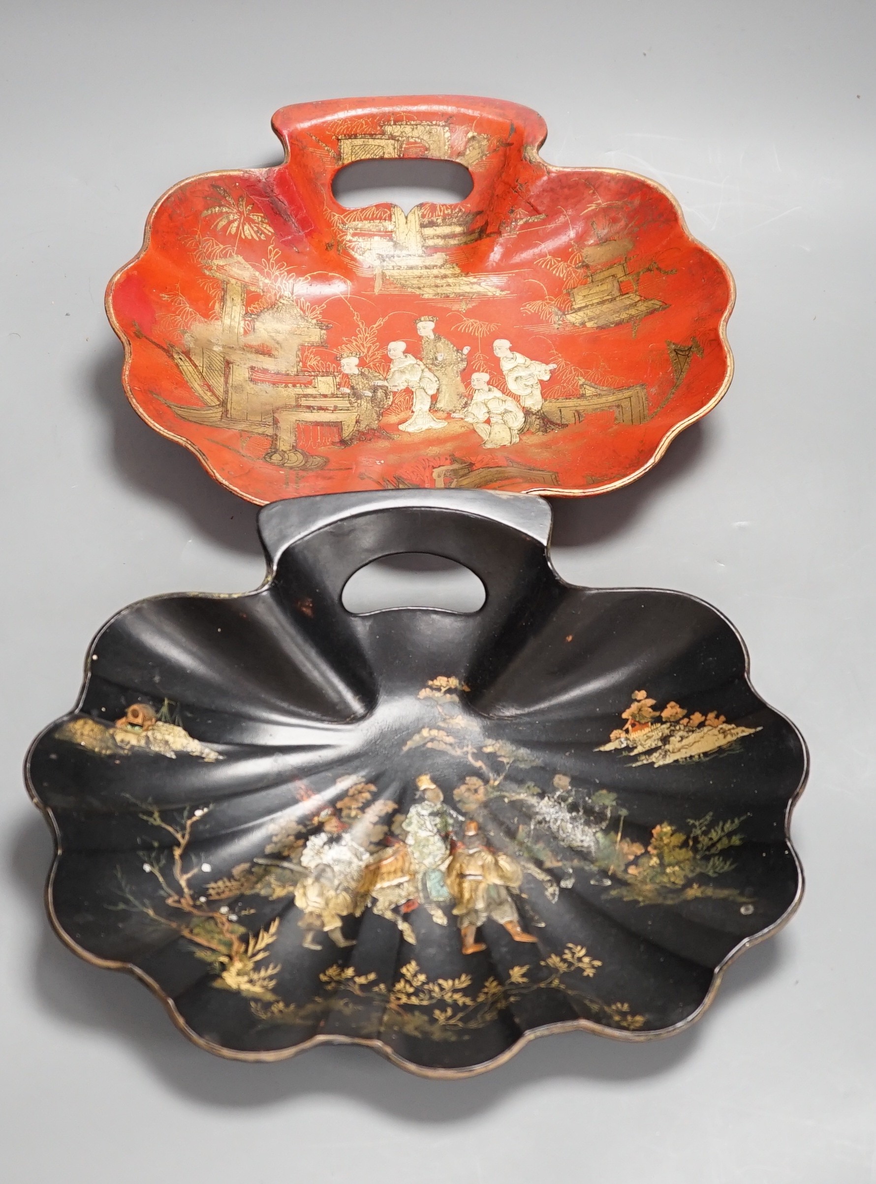 Two early 20th century japanned scallop shell dishes. 29cm wide